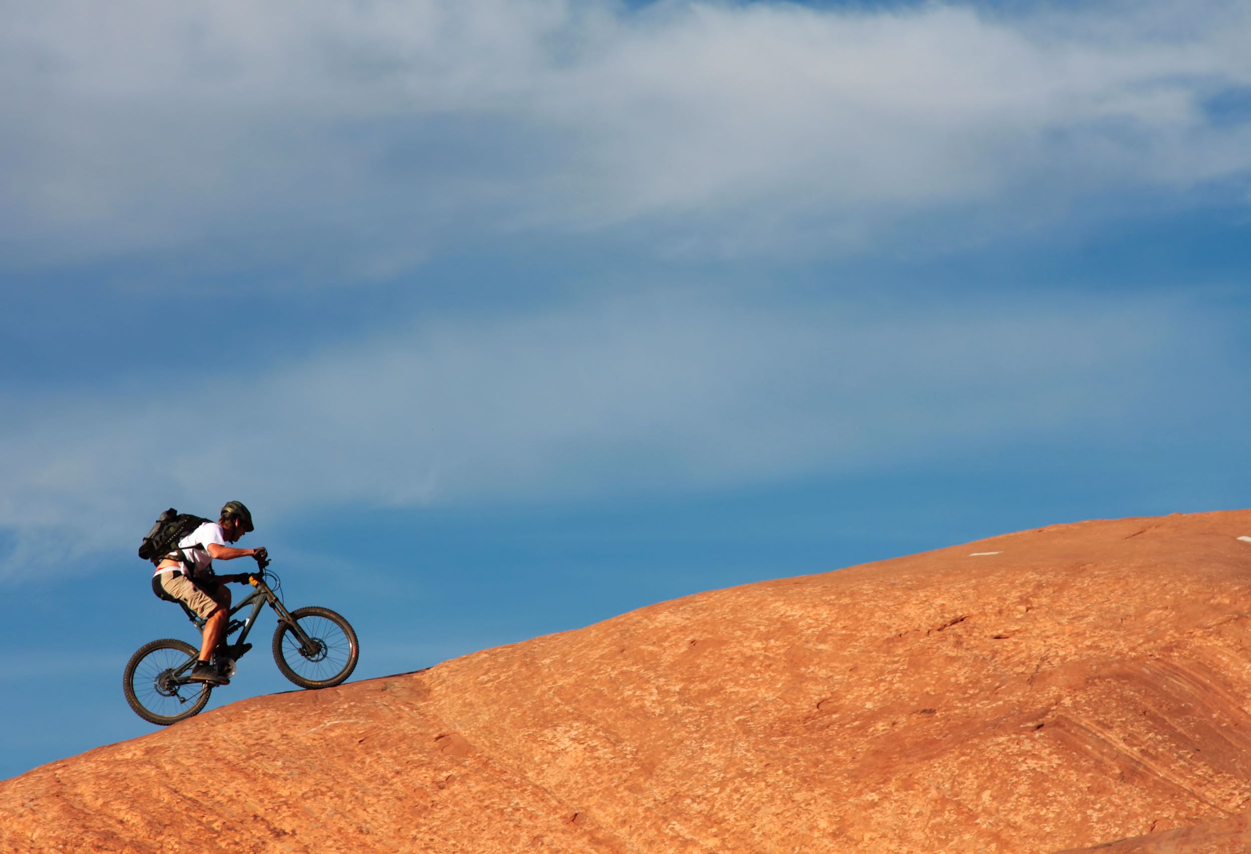 A cycling across Utah's red rocks.