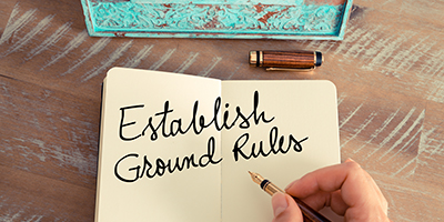 Writing in a notebook, establish ground rules.