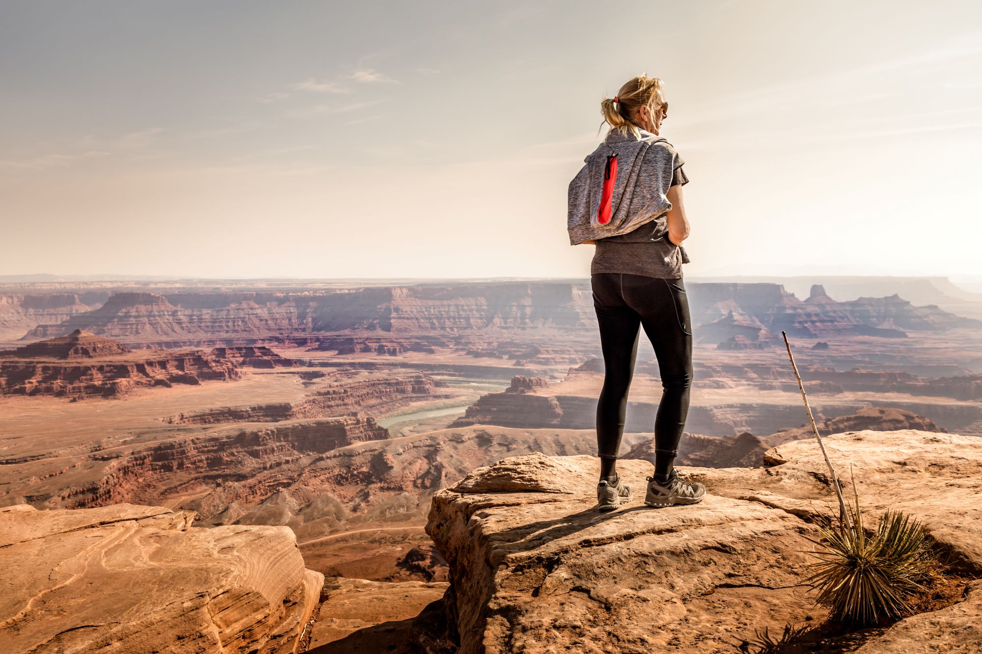 A woman enjoying the view from Dead Horse Point State Park.